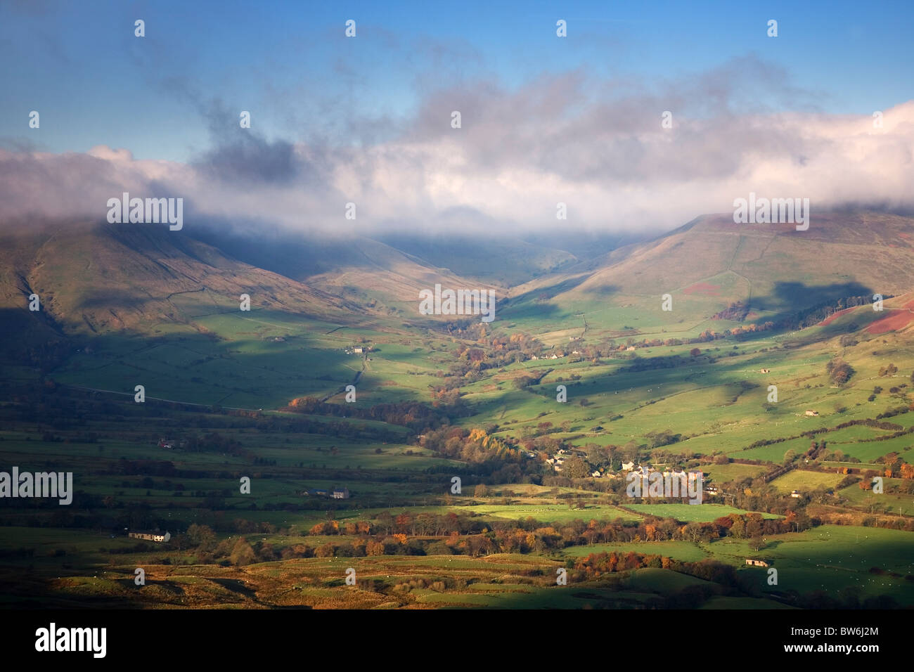 Low cloud hangs over The hilltops of The Vale Of Edale near Castleton Derbyshire Peak District UK Stock Photo