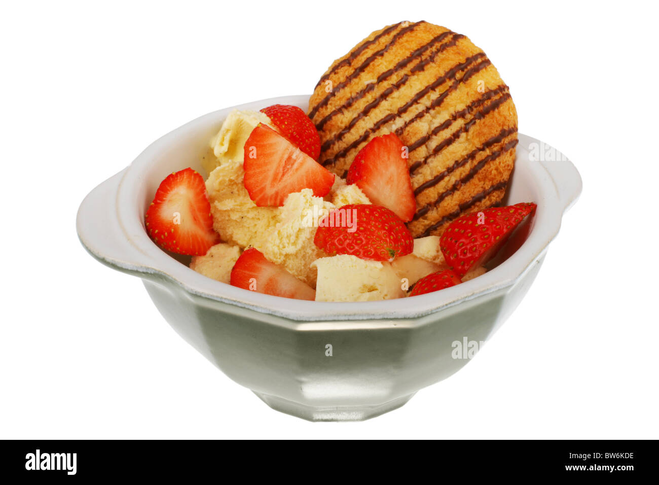 Vanilla Ice Cream with Strawberries and a Macaroon Stock Photo