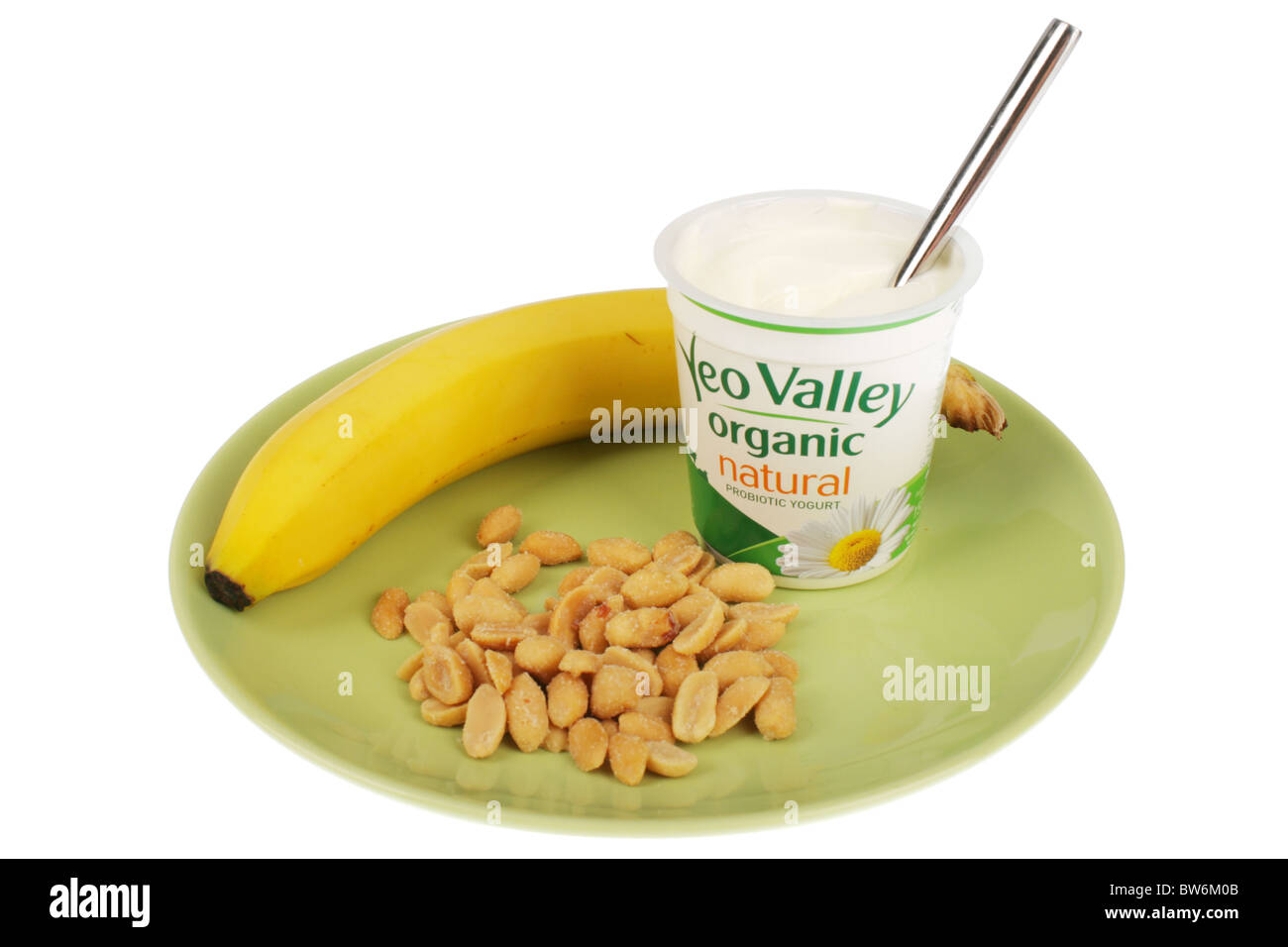 Yogurt with Banana and Salted Peanuts Stock Photo