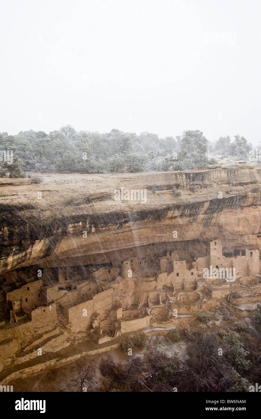 View of Cliff Palace cliff dwellings in a winter snow storm in Mesa Verde National Park, Colorado, USA. Stock Photo