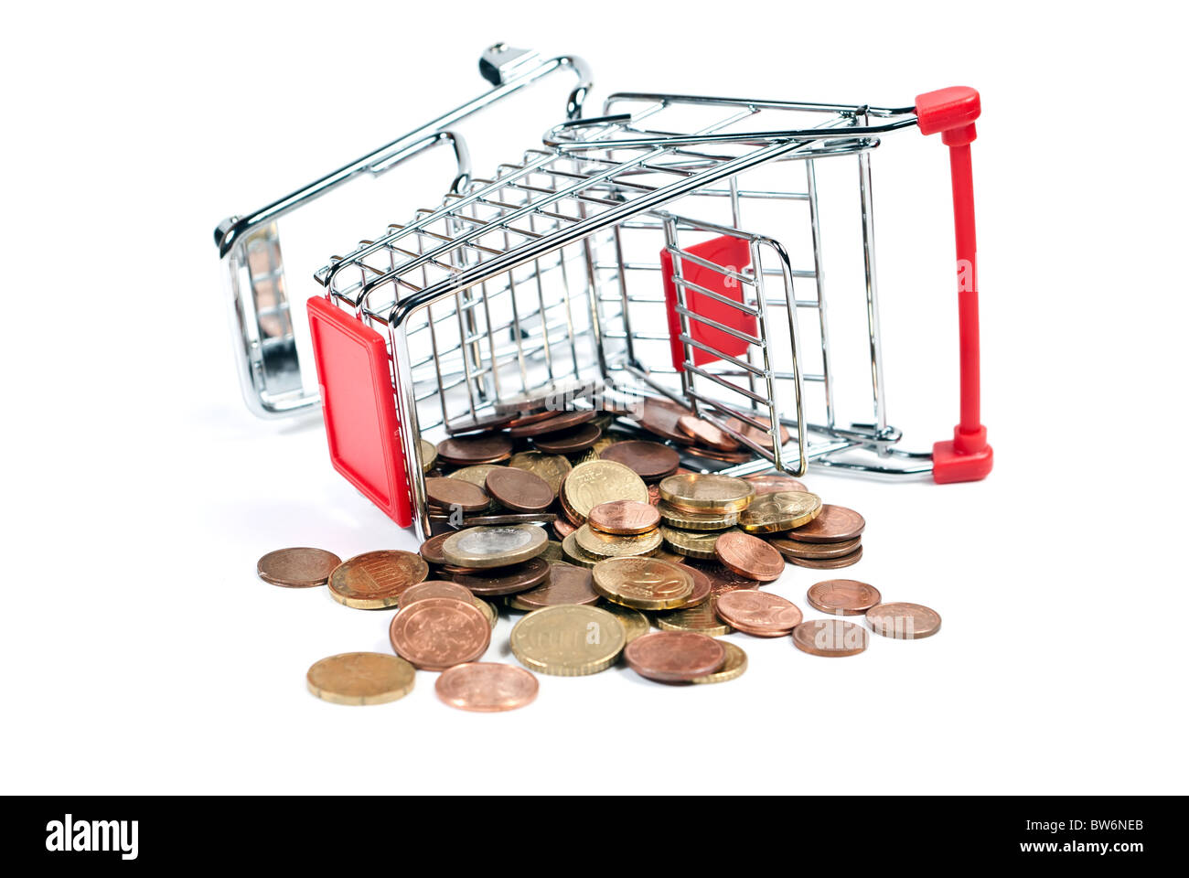 shopping cart with coins isolated on white background Stock Photo