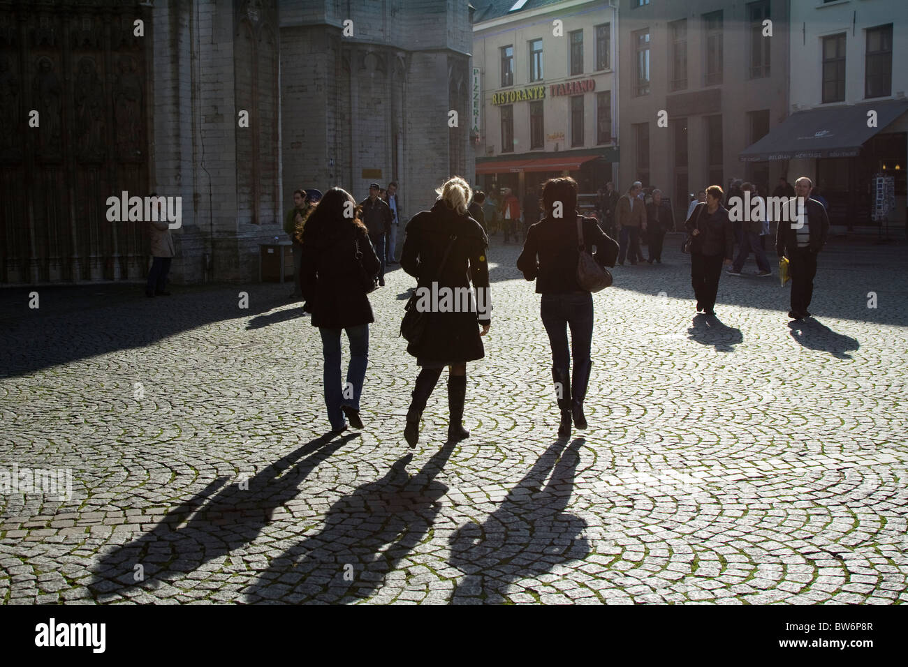 Women walk through road hi-res stock photography and images - Alamy