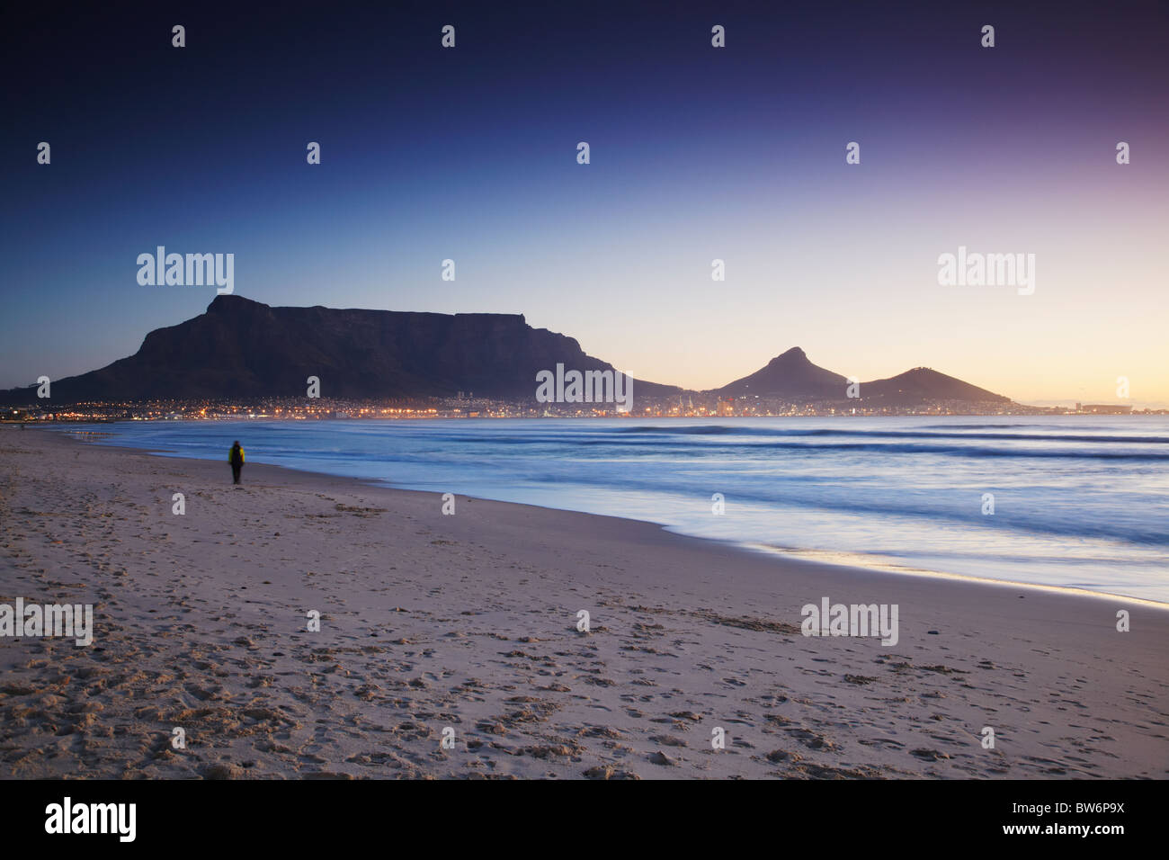 View of Table Mountain at sunset from Milnerton beach, Cape Town, Western Cape, South Africa Stock Photo