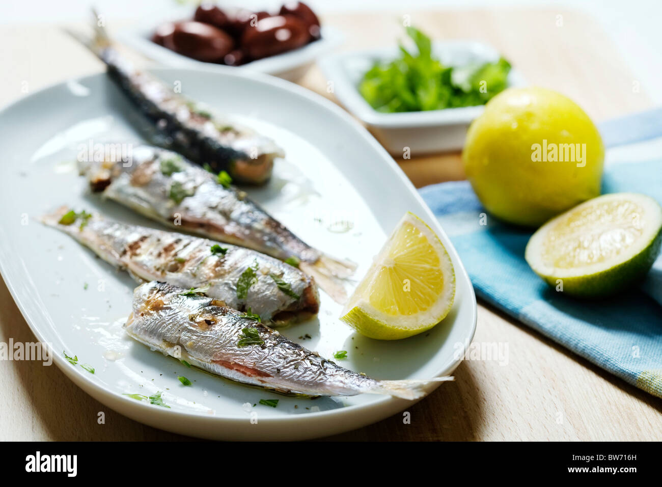plate of grilled sardines Stock Photo