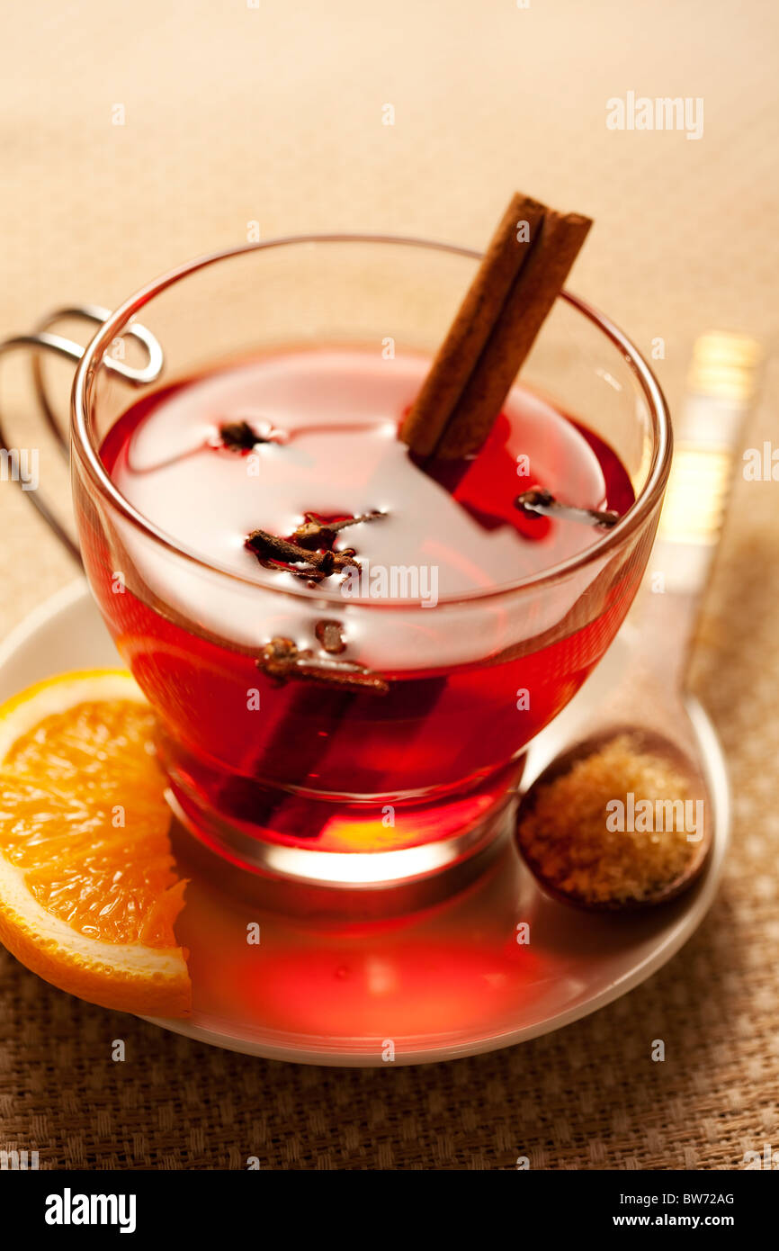 inviting warm spicy drink with ingredients Stock Photo