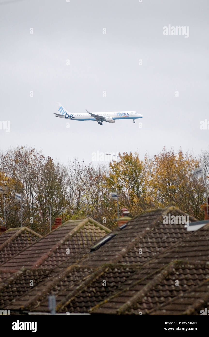 low flying aircraft near gatwick airport flightpath flight path living under near an busy planes plane airplane airplanes noise Stock Photo