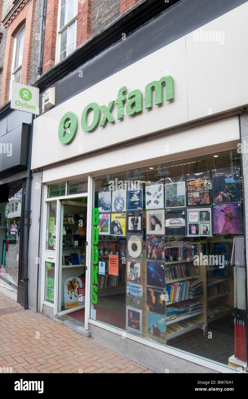 oxfam charity shops shop secondhand second hand clothes retail retailer charities uk high street highstreet logo brand branding Stock Photo