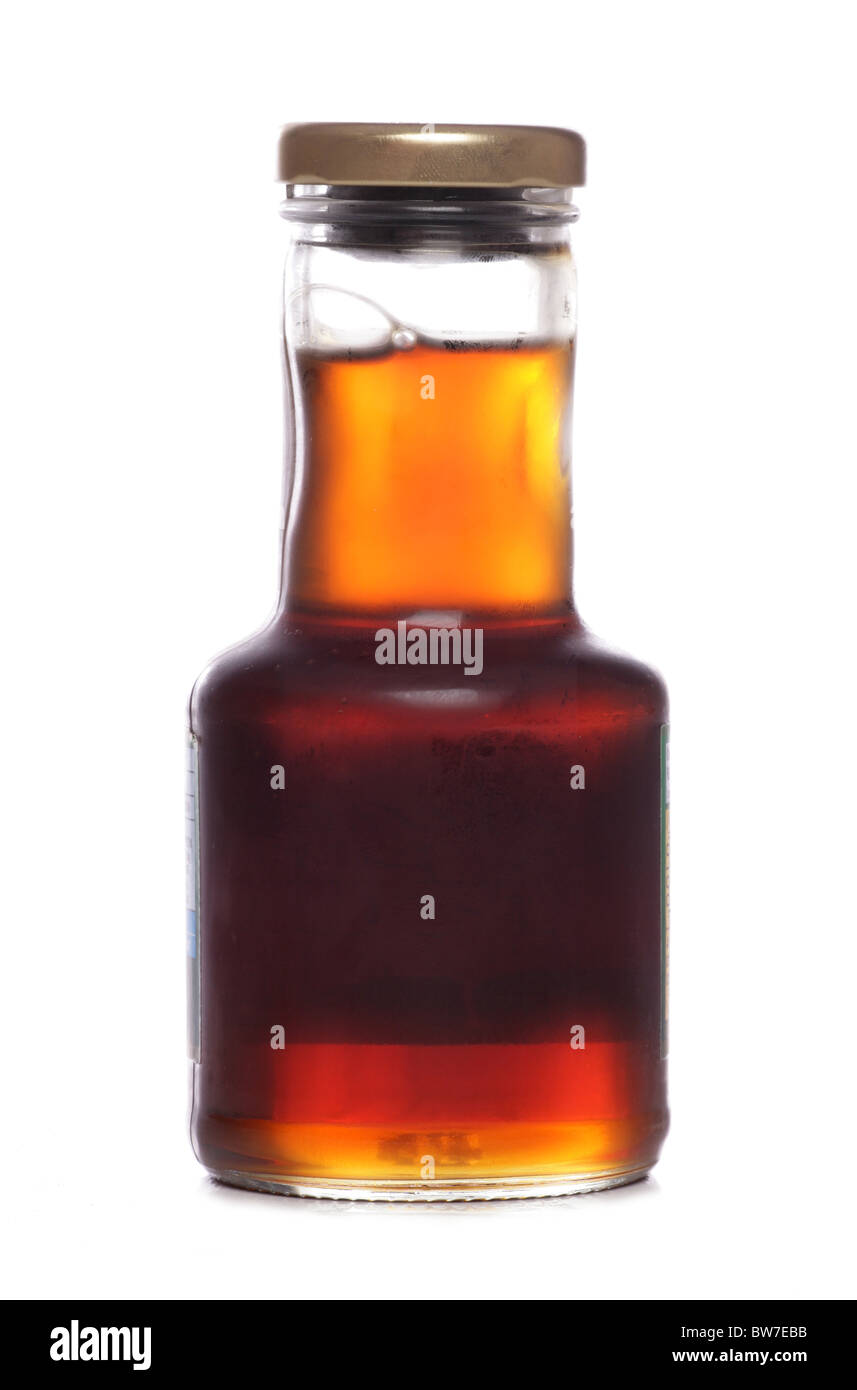 Maple syrup jar studio cutout Stock Photo