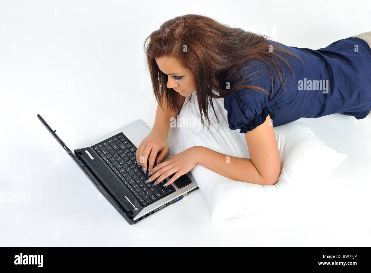 girl with laptop on white background Stock Photo - Alamy