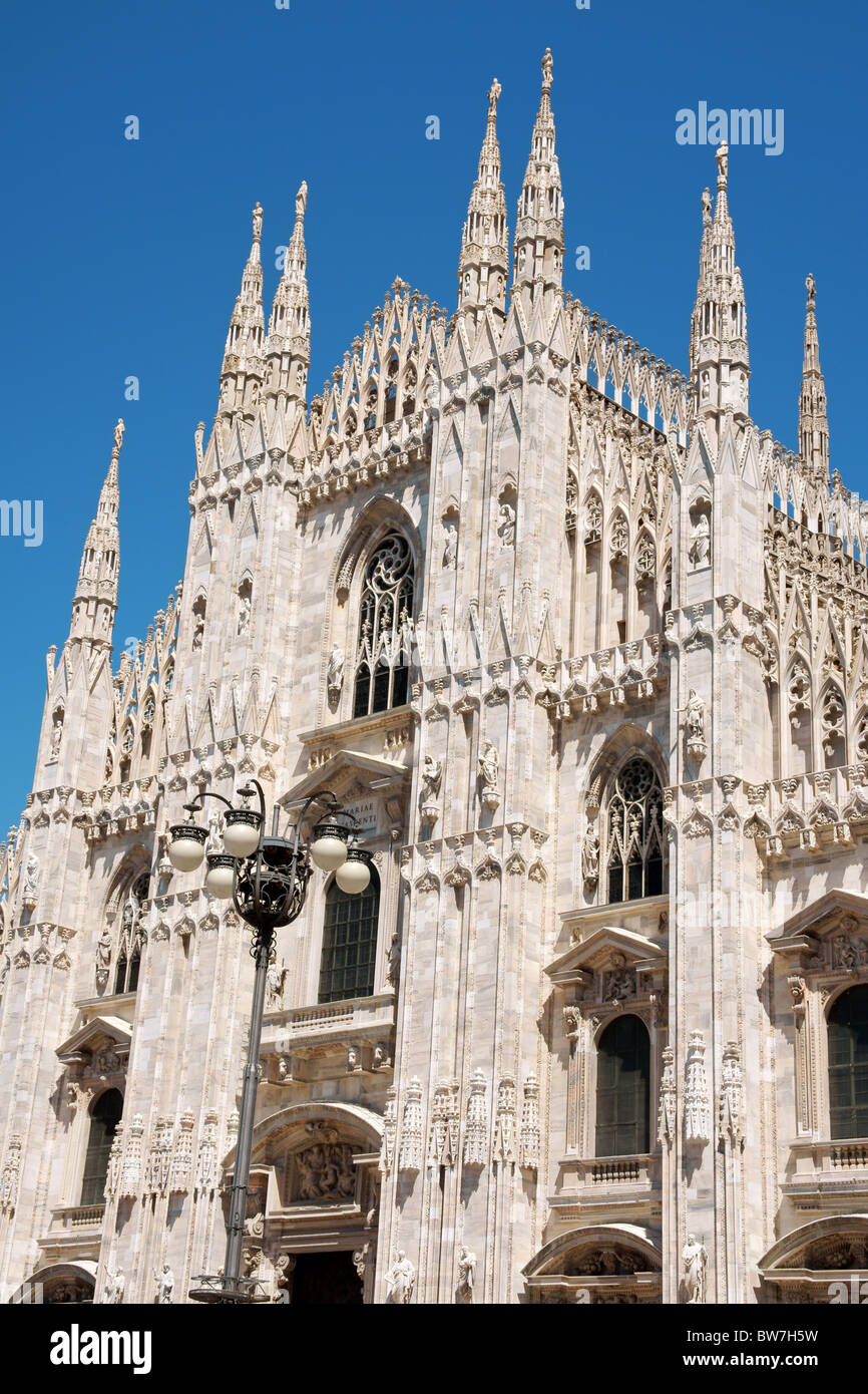 Gothic Architecture Of Milan Cathedral In Piazza Del Duomo Stock Photo gothic-architecture-of-milan-cathedral-in-piazza-del-duomo-stock-photo