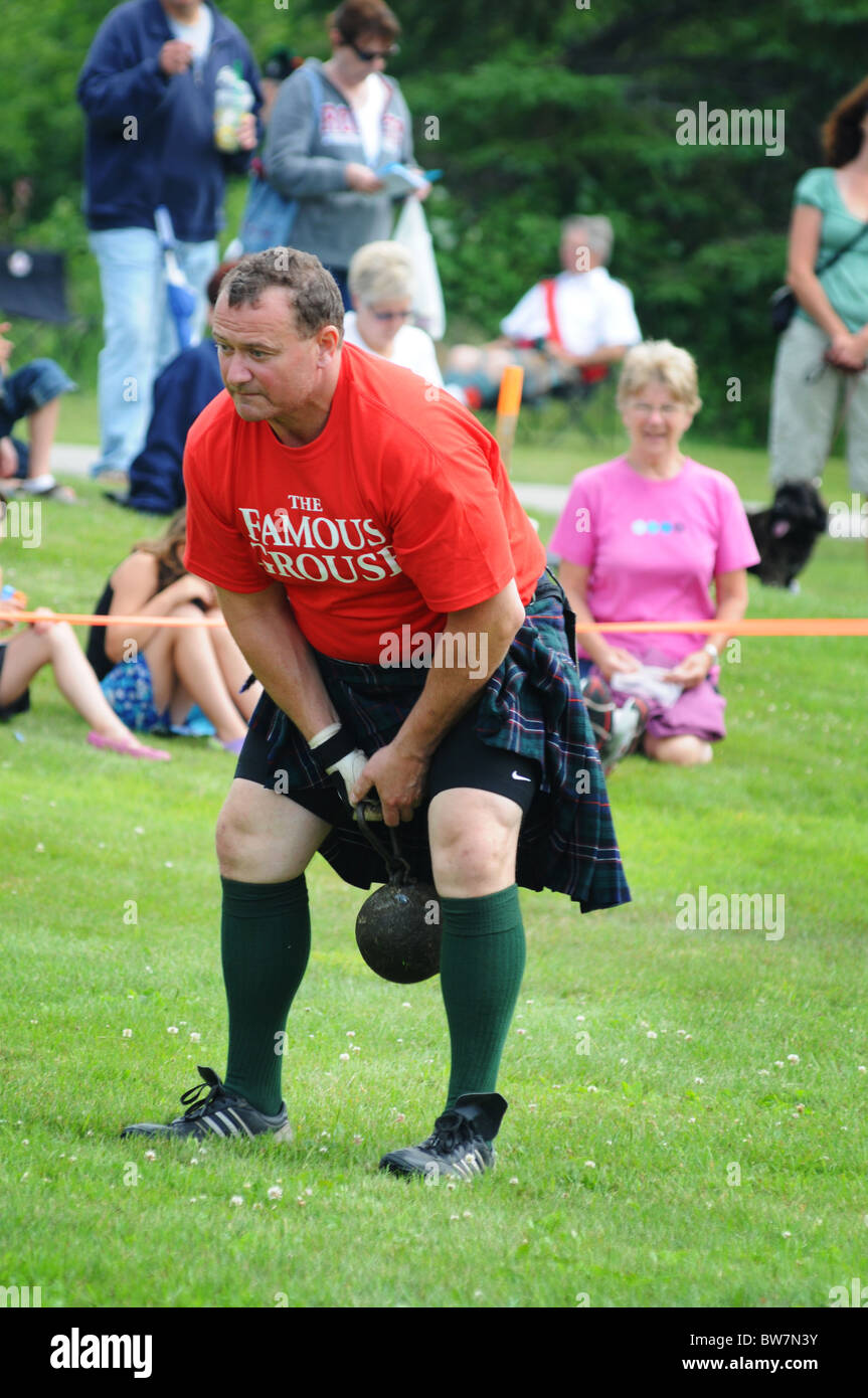 competitor in the shot put highland games in Haliburton, Ontario, Canada Stock Photo