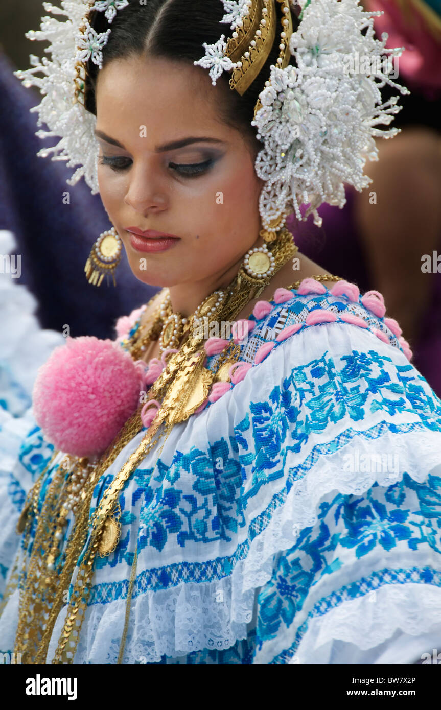 Closeup view of a lovely young woman wearing a pollera and dancing during a parade in Pedasi Panama. Stock Photo