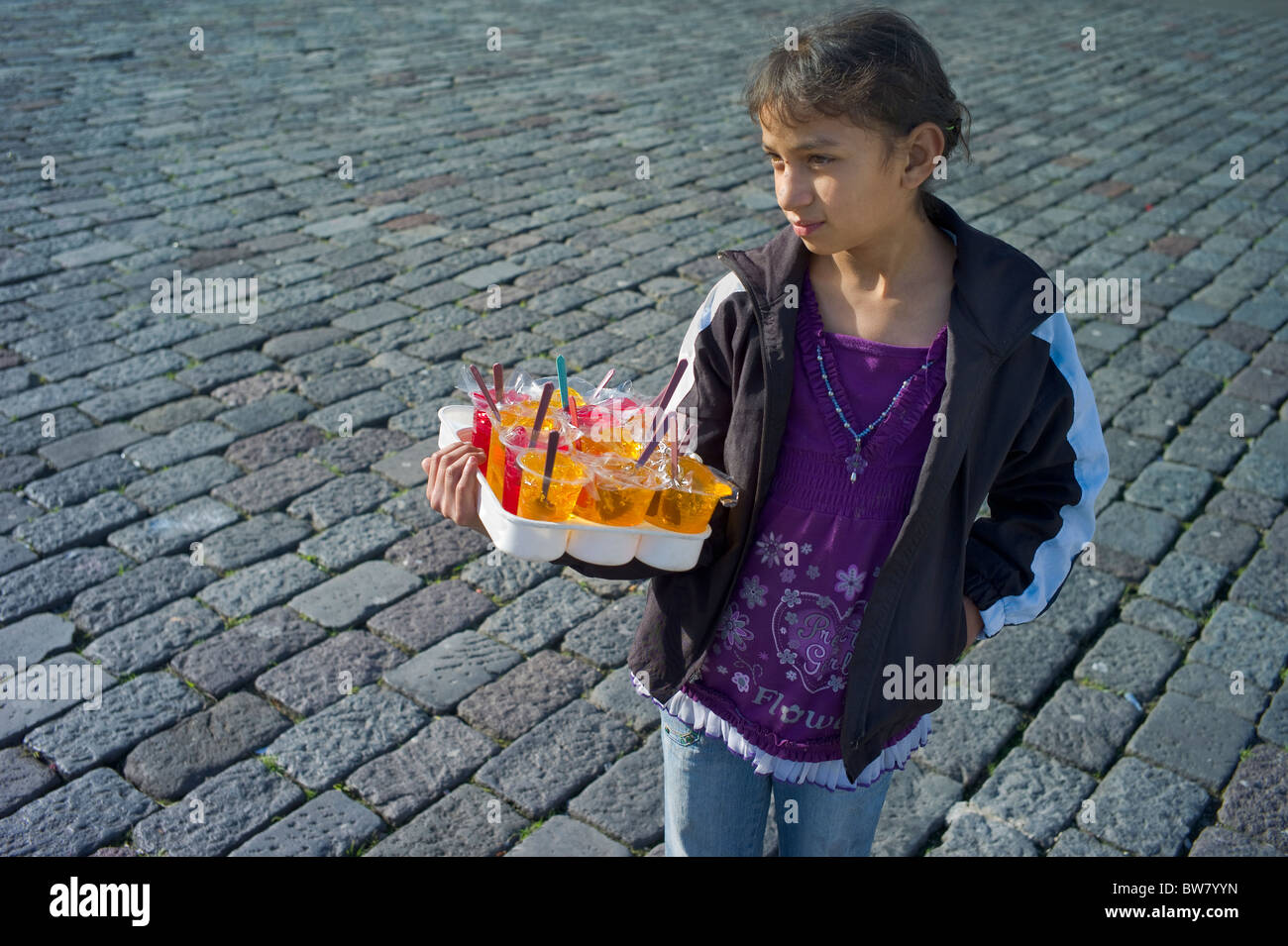 Young girl vending jello on street, Quito, Ecuador Stock Photo