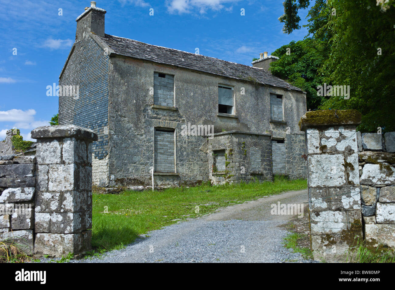 Derelict two-storey rectory house in rural setting, Kilfenora, County Clare, Ireland Stock Photo
