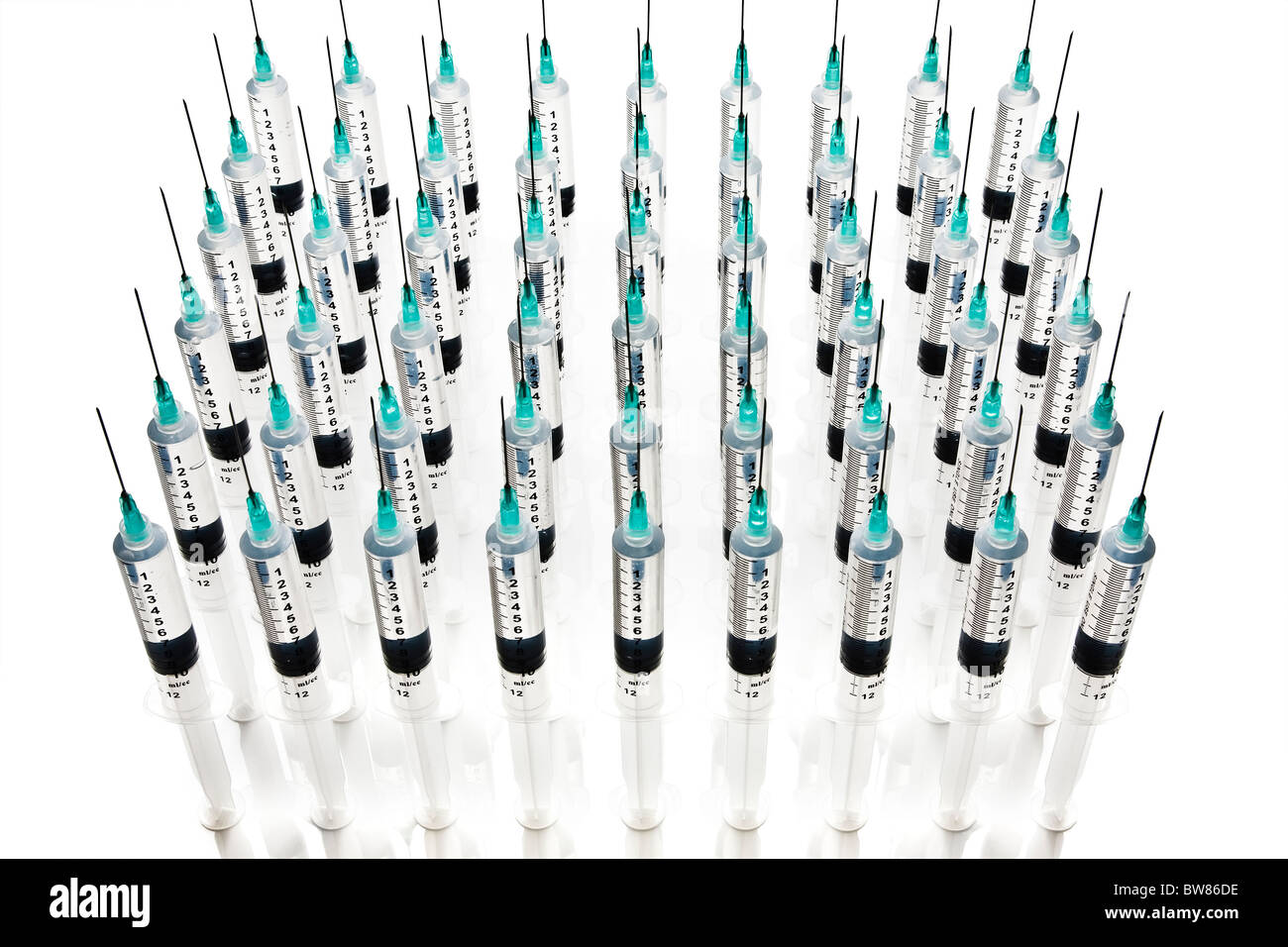 Multiple rows of syringes Stock Photo