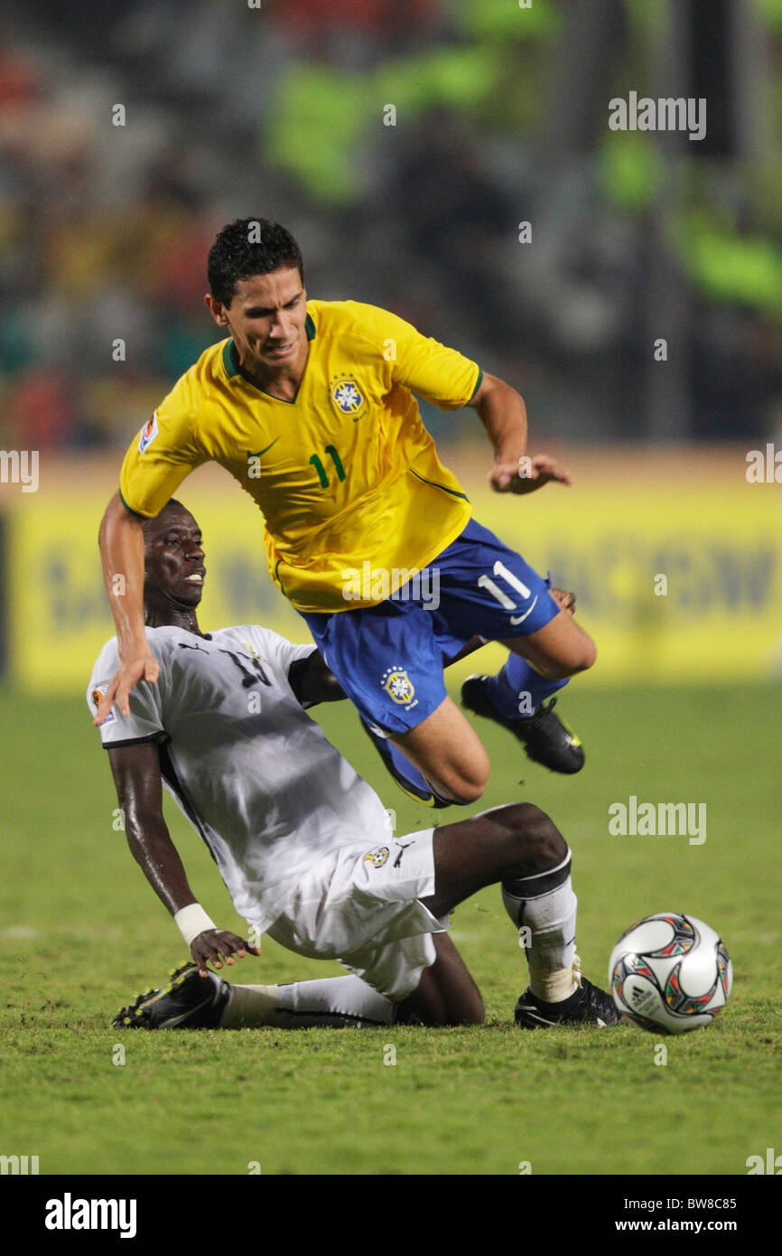 Mohammed Rabiu of Ghana (l) tackles Ganso of Brazil (r) during the FIFA U-20 World Cup final October 16, 2009 Stock Photo