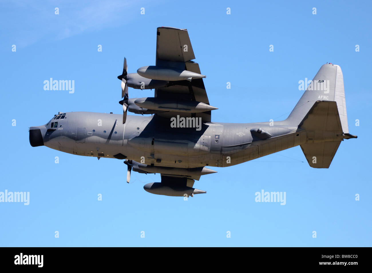 Lockheed MC-130E Hercules Combat Talon I operated by the US Air Force climbing out after take off from RAF Fairford Stock Photo
