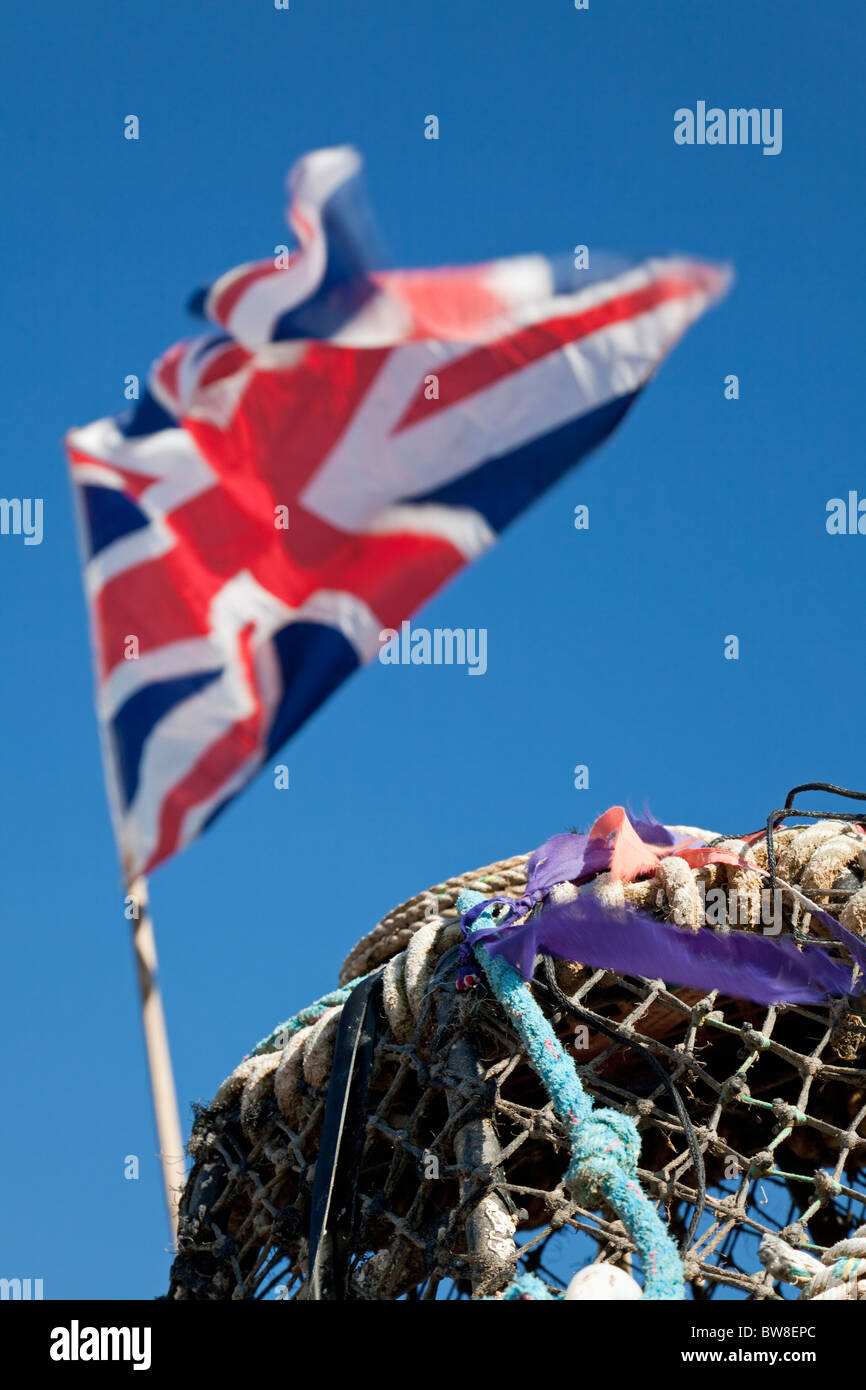 Lobster Pot and Union Jack Flag, Beesands, South Devon, England, UK Stock Photo