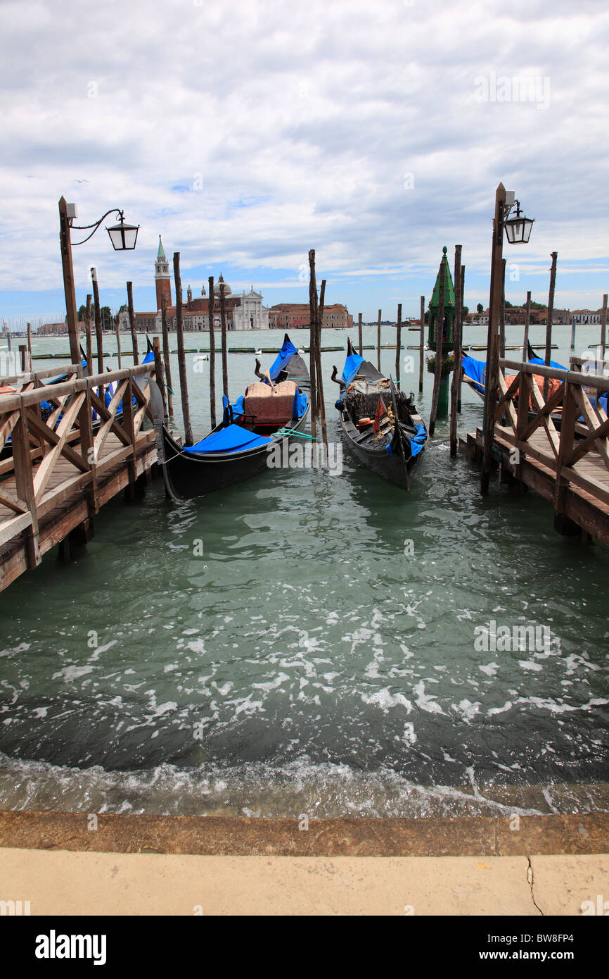 Gondolas on the lagoon at the Piazza di San Marco in Venice, Italy ...