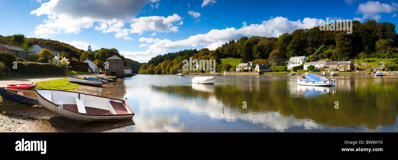 Panoramic shot of Lerryn Cornwall in Autumn with stunning reflections in the calm water. Stock Photo