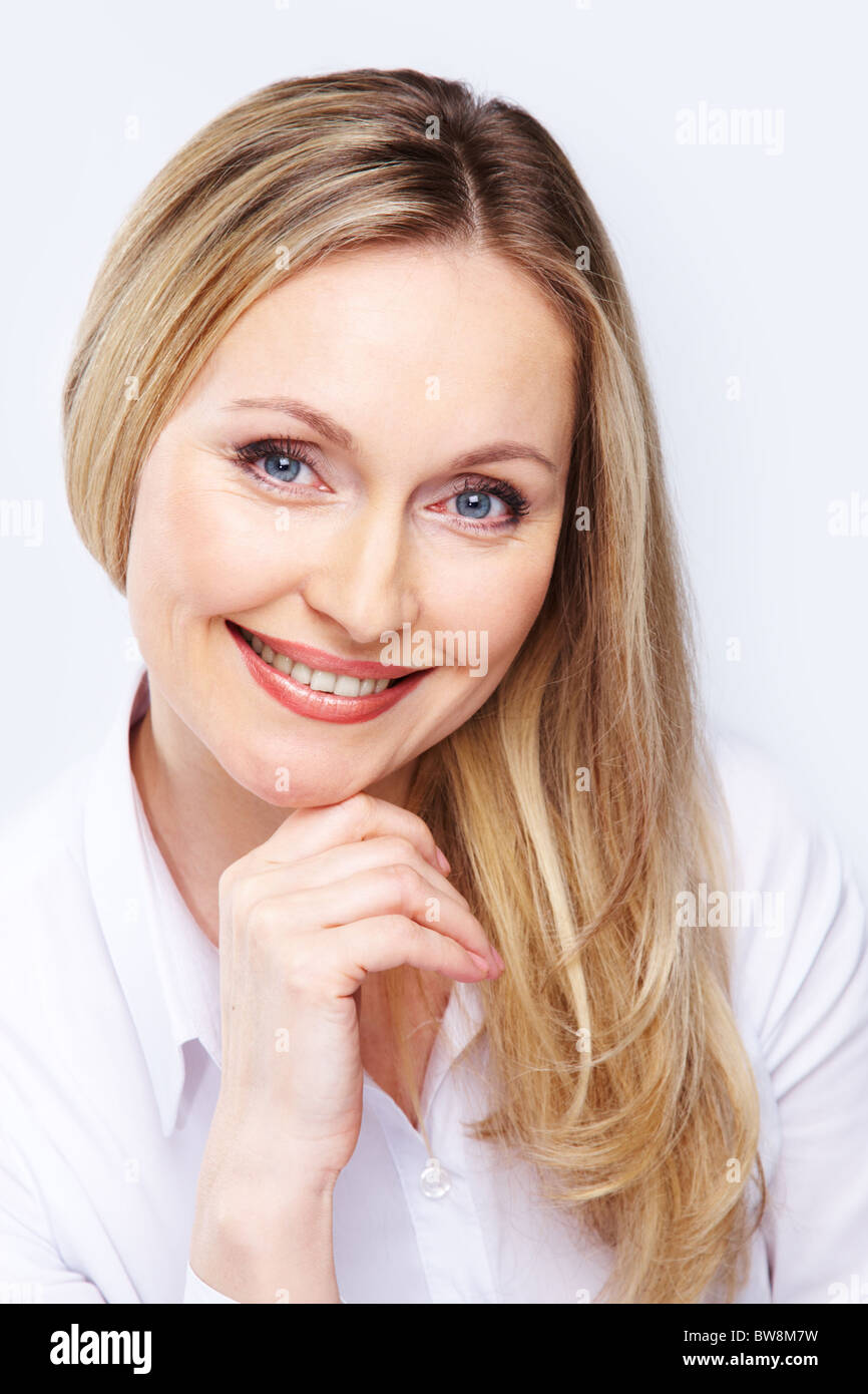 Portrait of beautiful woman with smile looking at camera Stock Photo ...