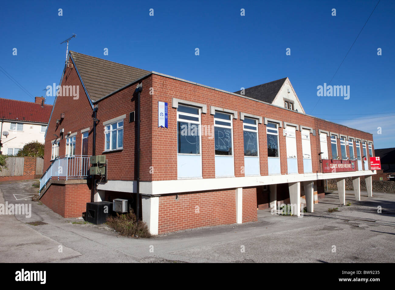 Derelict and empty Clowne Miners Welfare building in the former Derbyshire coal mining community. Stock Photo