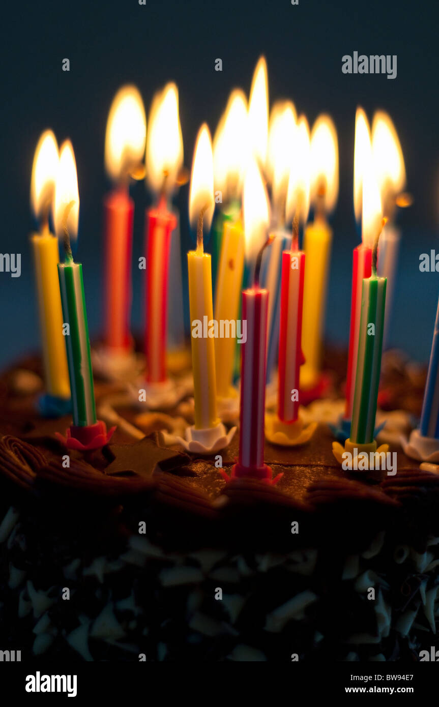 A chocolate birthday cake with candles Stock Photo - Alamy
