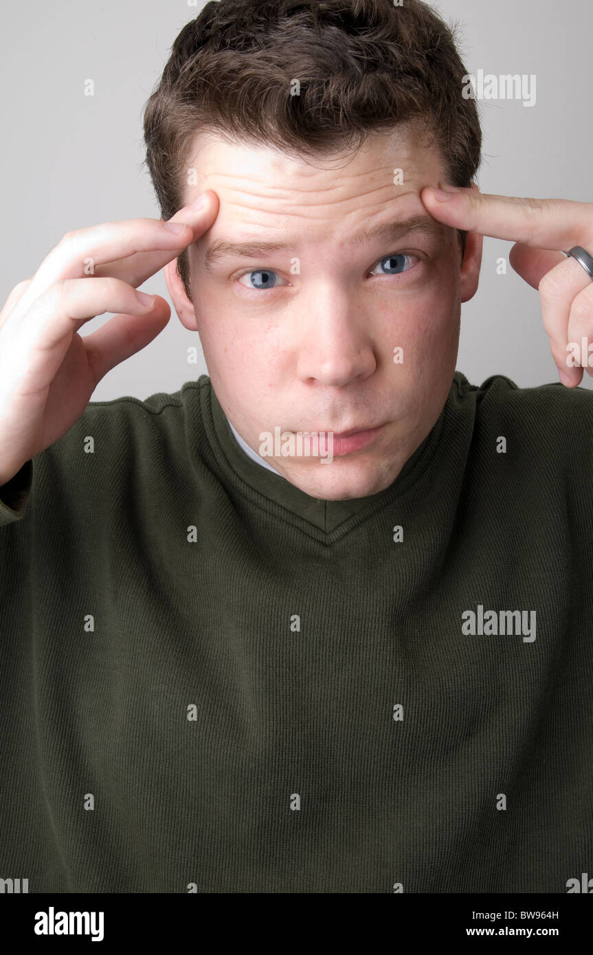 Portrait of Male with Headache Stock Photo