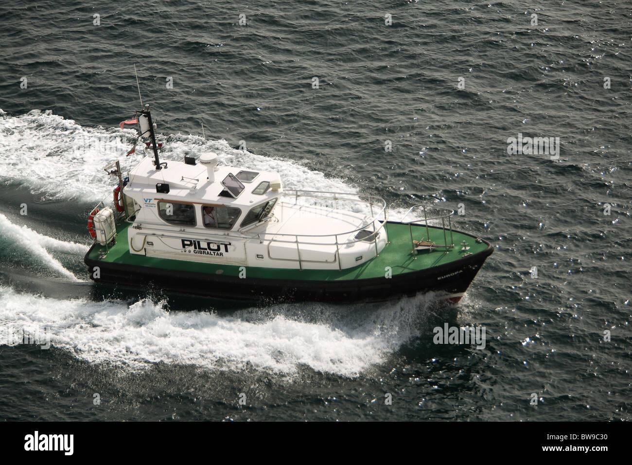 Gibraltar pilot launch en route to ship Stock Photo Alamy