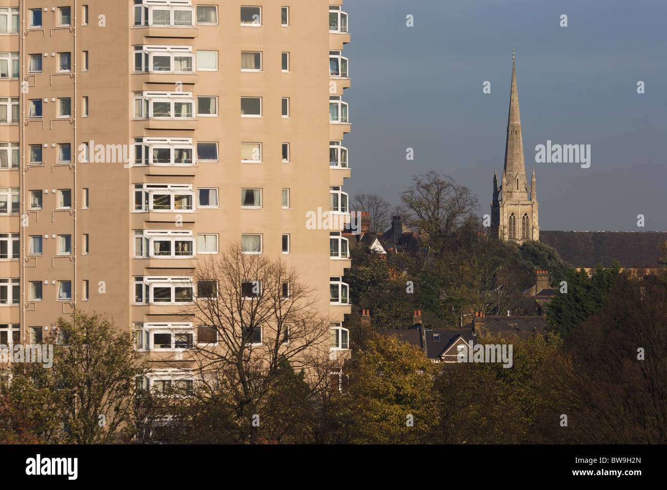 High-rise flats and spire of St. Paul's Church seen from Brockwell Park, Herne Hill, South London. Stock Photo