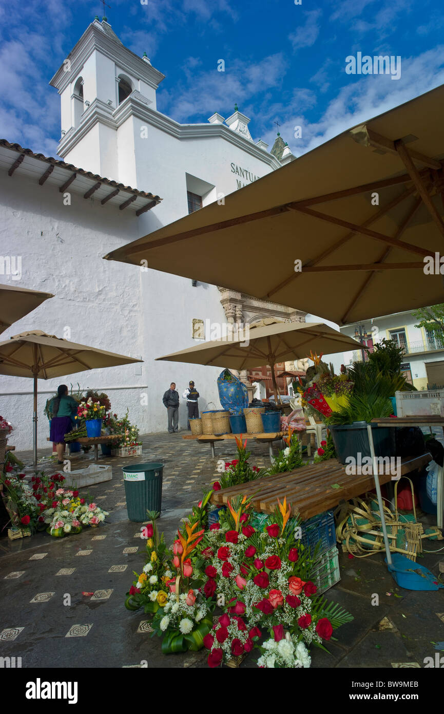 Flower market, church, Cuenca, Ecuador Stock Photo