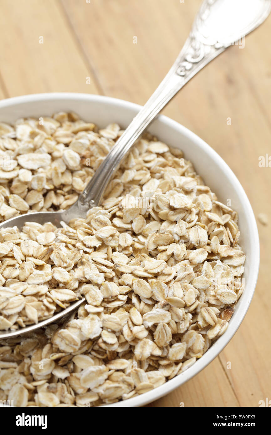photo shot of oatmeal on wooden table Stock Photo