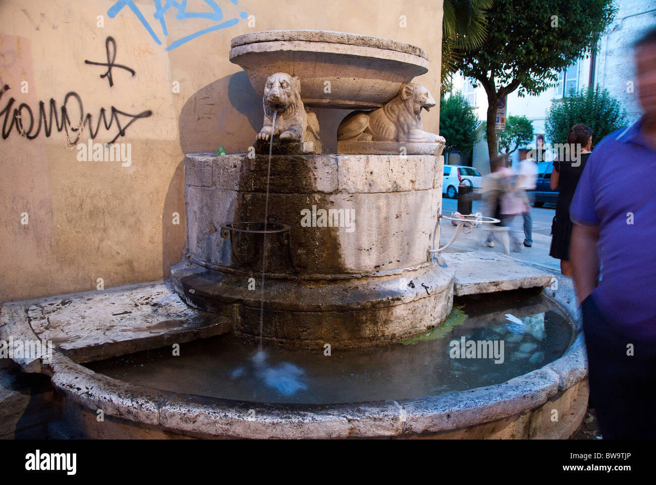 Fountain with lions in Ascoli Piceno in the early evening Stock Photo