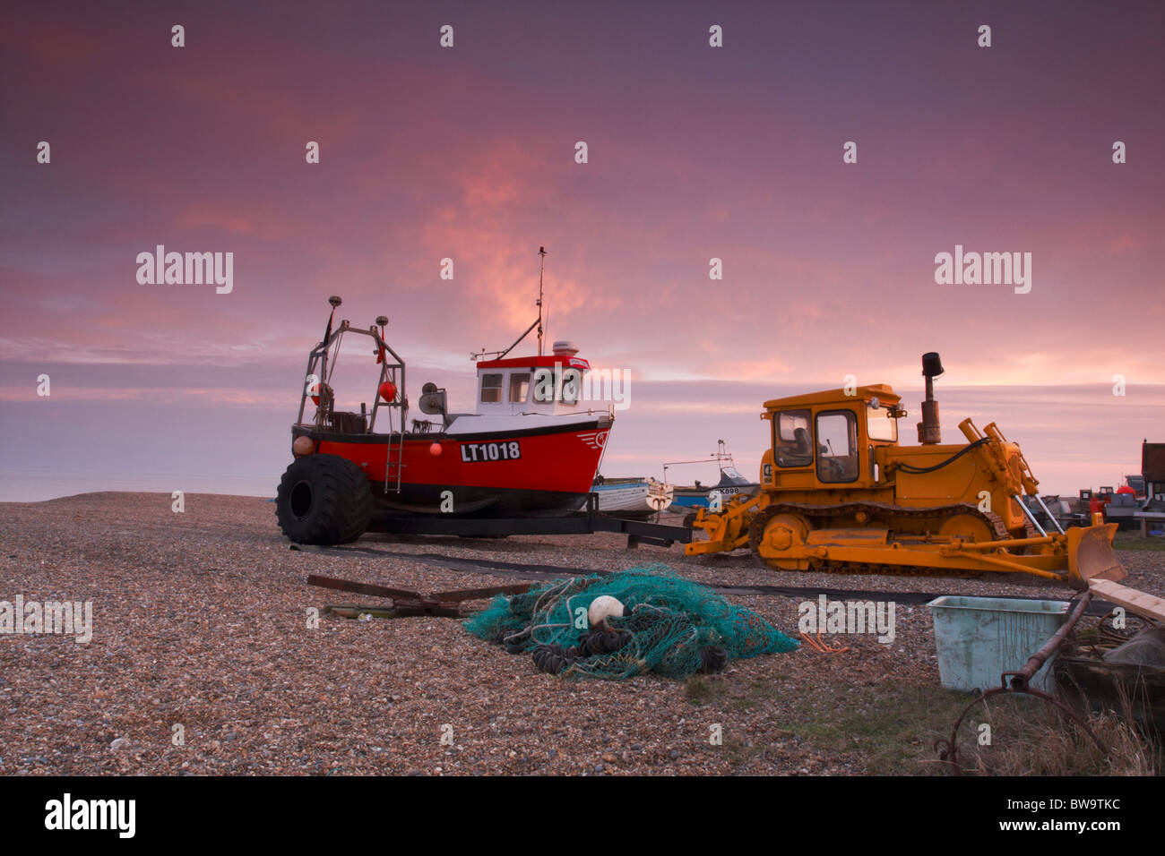 Fishing boats on Aldeburgh Beach at sunset Stock Photo