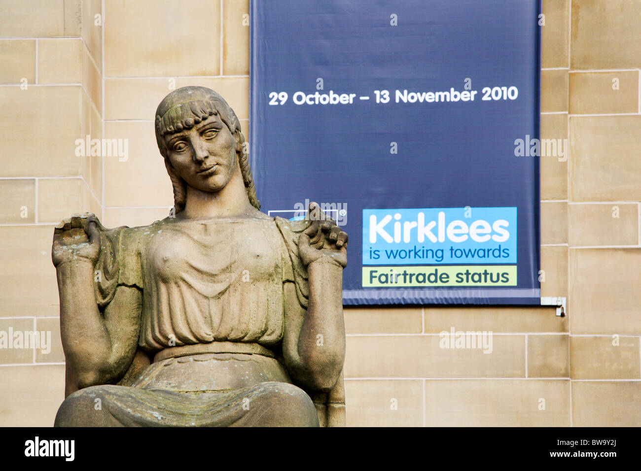 Statue and Fairtrade Exhibition Banner Huddersfield West Yorkshire England Stock Photo