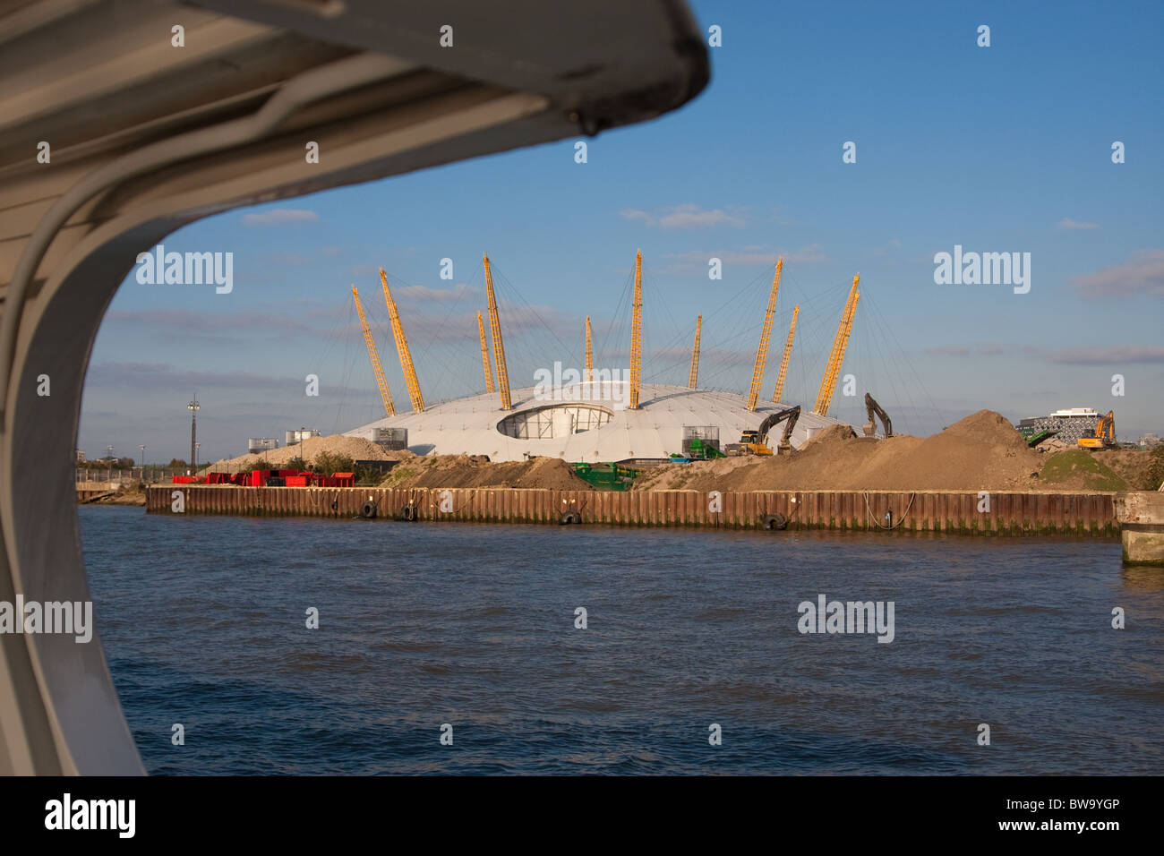 The O2 (formerly the Millenium Dome) in Greenwich, London, viewed from a passenger ferry on the River Thames. Stock Photo