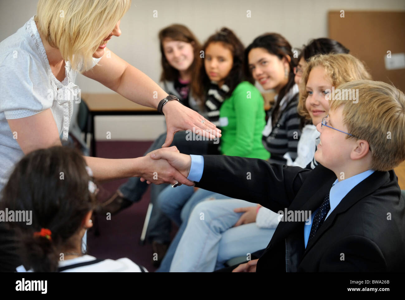 Etiquette teacher Lisa Shortland takes a class of overseas pupils at Downside Summer School, Somerset UK Stock Photo