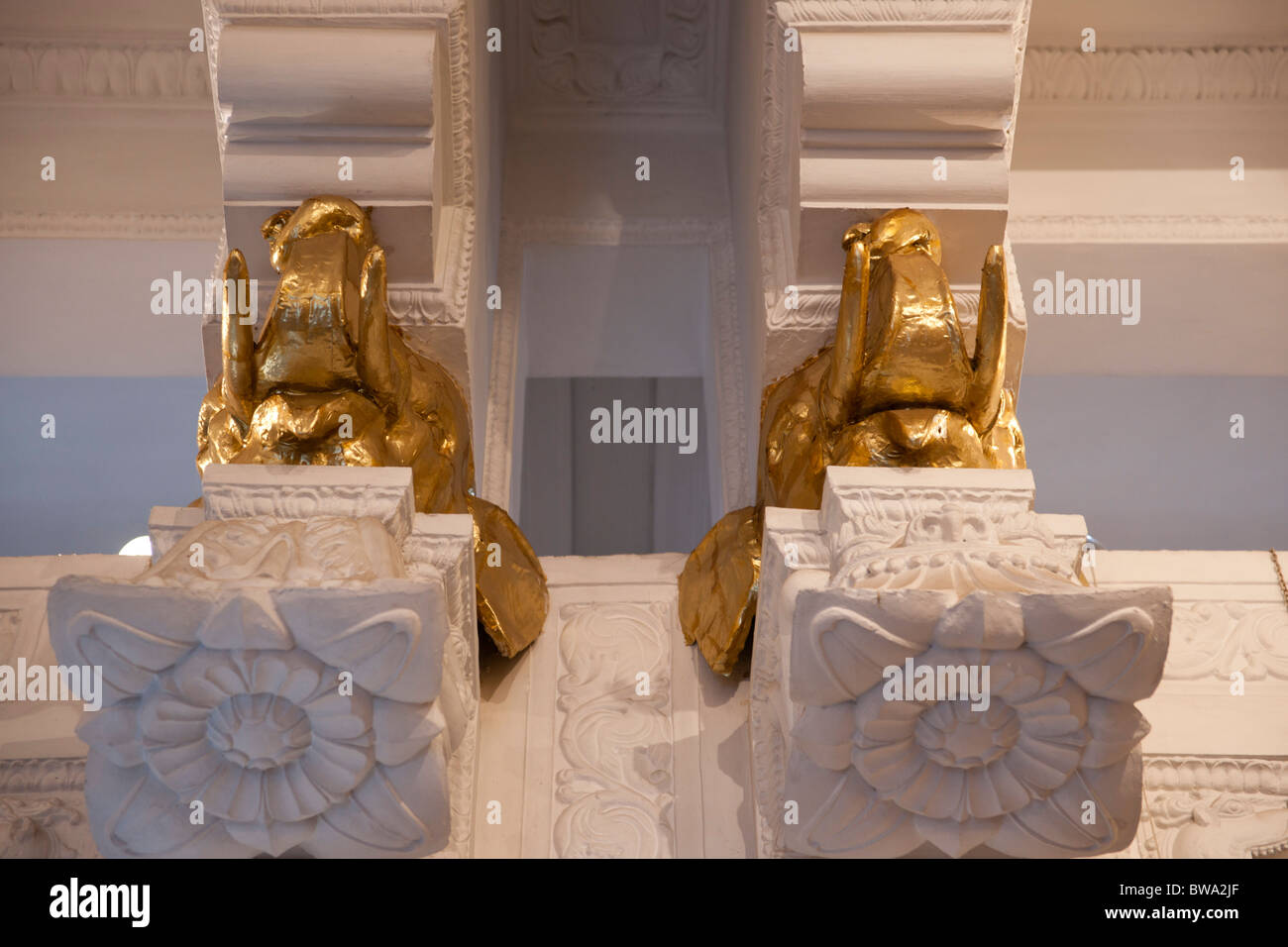 Golden Elephant head corbels in the Temple of the Tooth, Kandy, Sri Lanka Stock Photo