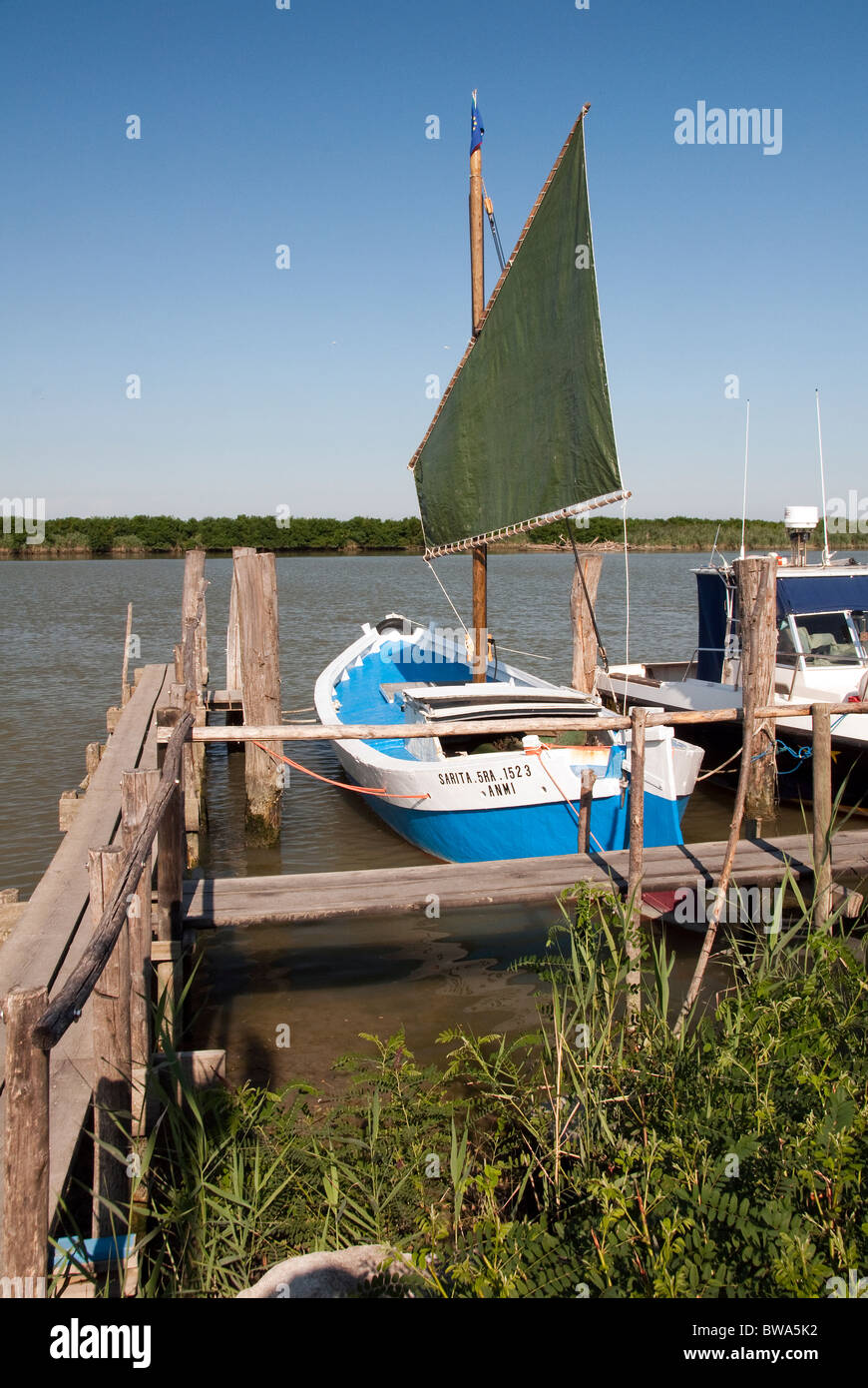 fishing boat with a traditional Gaff rig moored at Gorino, in the