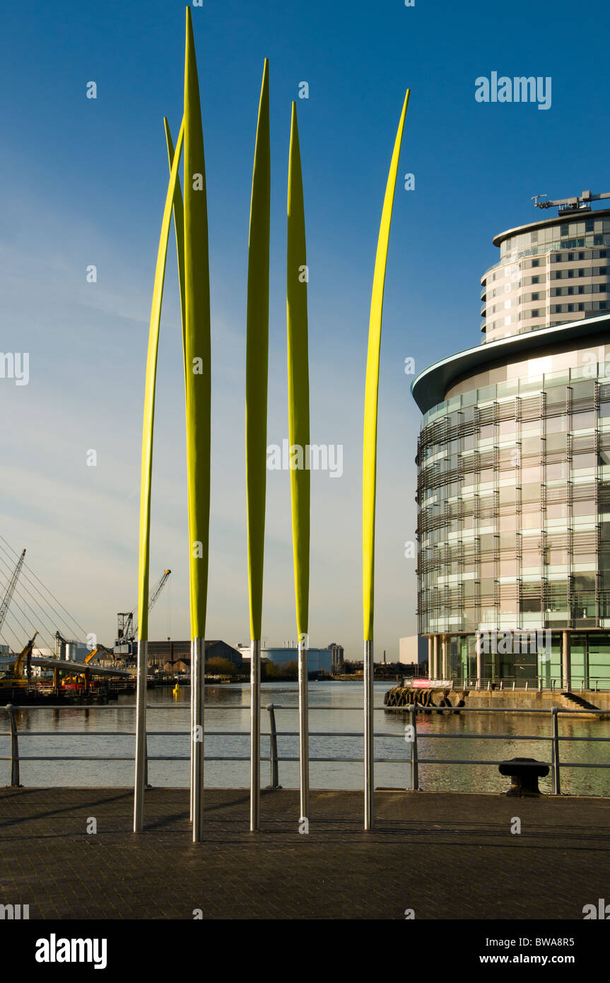 Where The Wild Things Were, a sculpture by Unusual, at Salford Quays, Manchester, England, UK. MediaCityUK buildings behind. Stock Photo