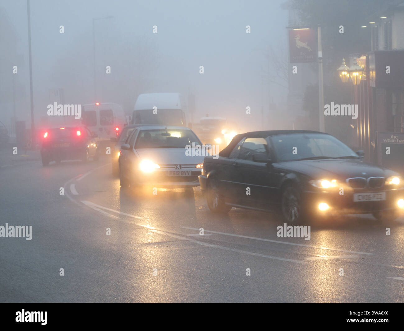 London fog night dark foggy day street lights Stock Photo - Alamy