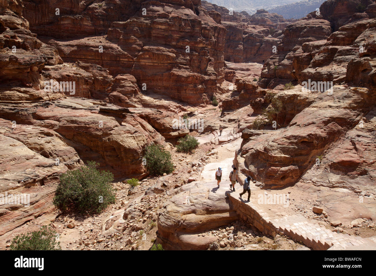 Tourists climbing to El Deir (or Monastery), Petra, Jordan Stock Photo