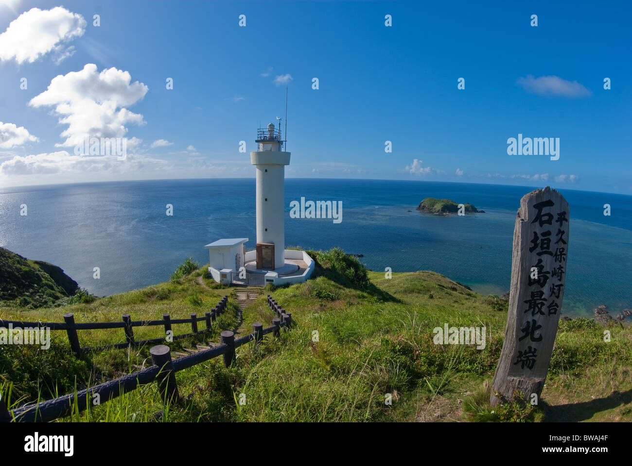 Hirakubosaki Lighthouse and sign for the most Northerly Point on Ishigaki Island, Okinawa, Japan, Asia Stock Photo