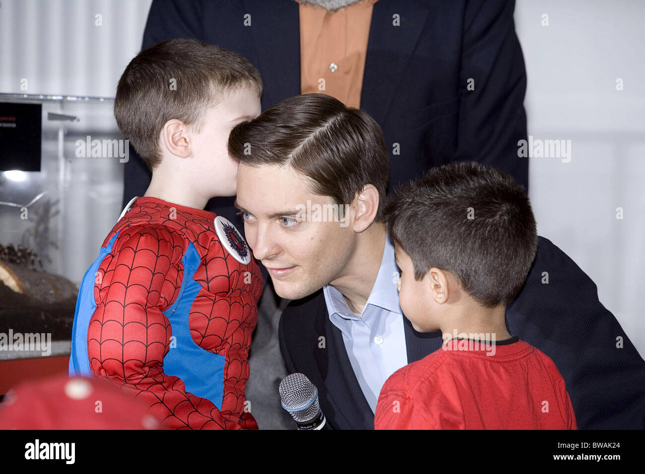Kids Visit Tobey Maguire at Exhibit of Live Spiders for SPIDER-MAN WEEK Stock Photo