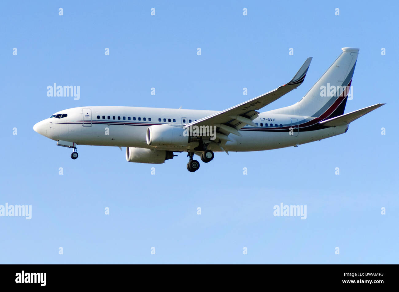 Boeing 737-7BC (BBJ) operated by Global Jet Luxembourg on approach for landing at London Farnborough Airport Stock Photo