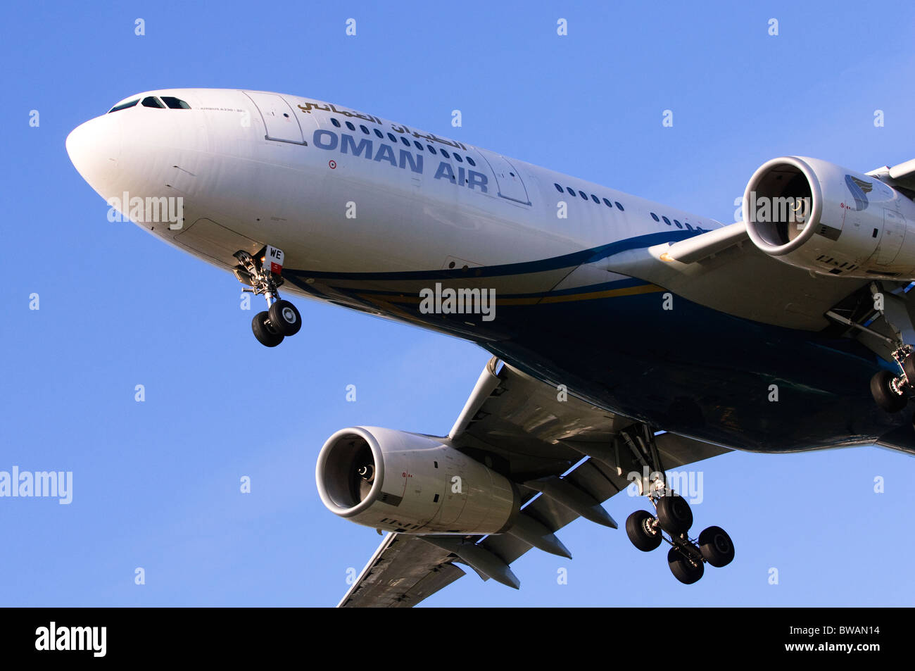 Airbus A330-200 operated by Oman Air on approach for landing at London Heathrow Airport Stock Photo