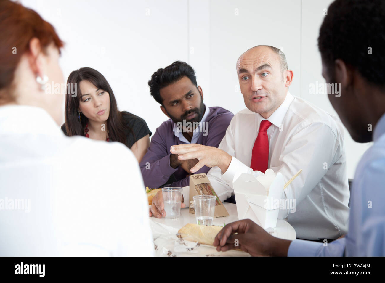 Discussion during business lunch Stock Photo Alamy