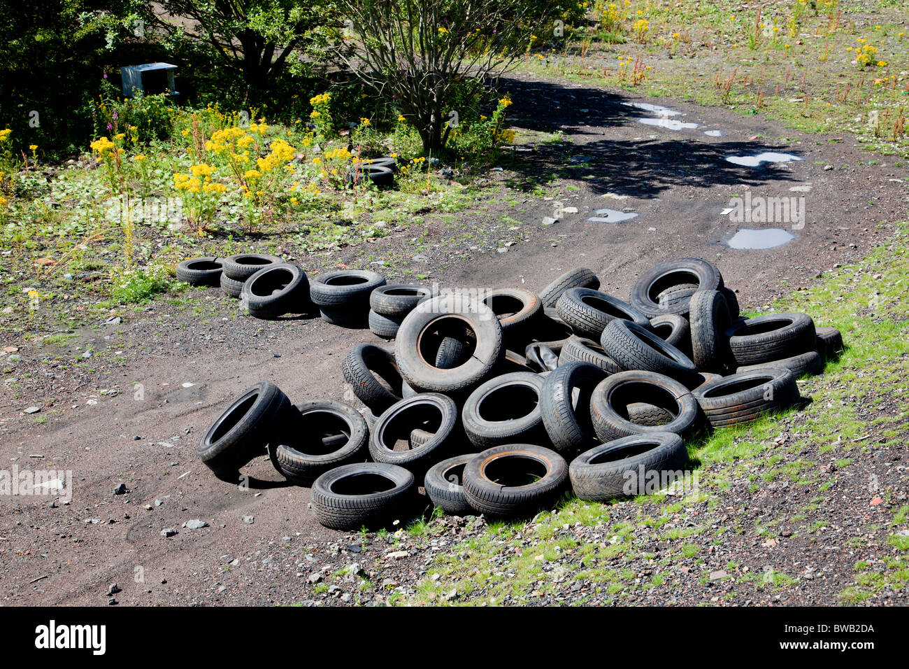Pile of abandoned tyres Stock Photo