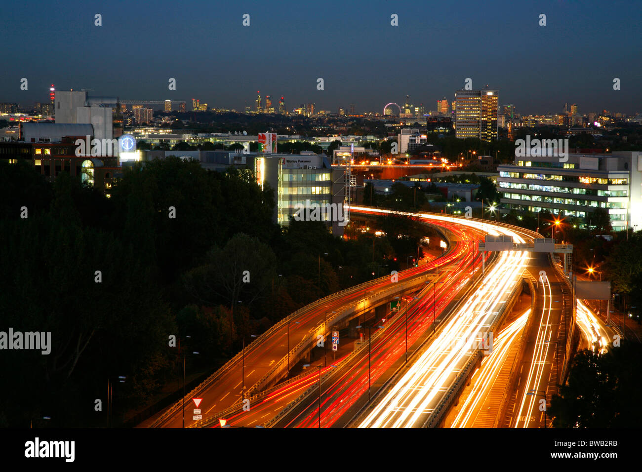 View east along the elevated section of the M4 at Brentford to central London skyline in the far distance. Stock Photo