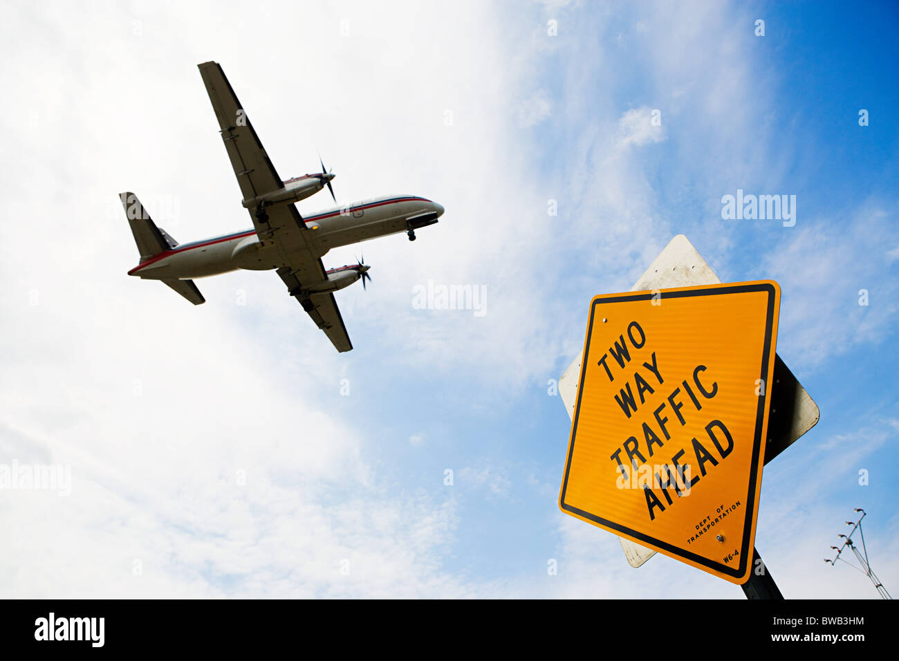 Airplane and sign Stock Photo - Alamy
